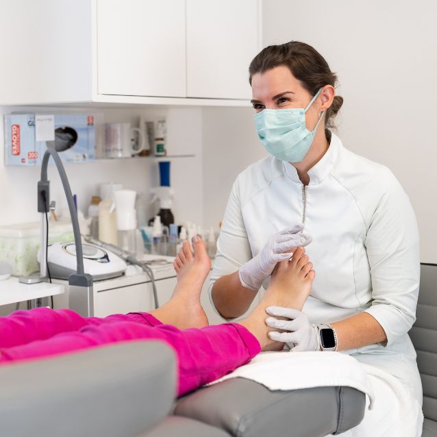 podiatrist seeing a patient
